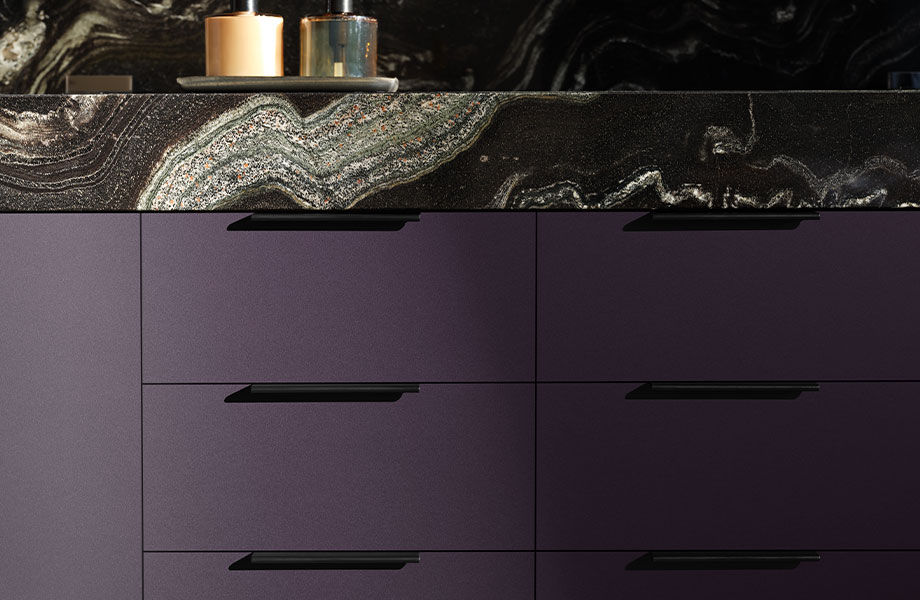 Contemporary bathroom vanity with FENIX J0790 Viola Orissa cabinets and black marble countertop with striking silver veins and soap pumps