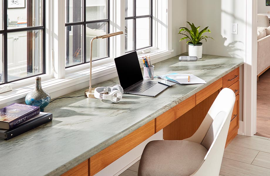 Built-in desk under a series of windows